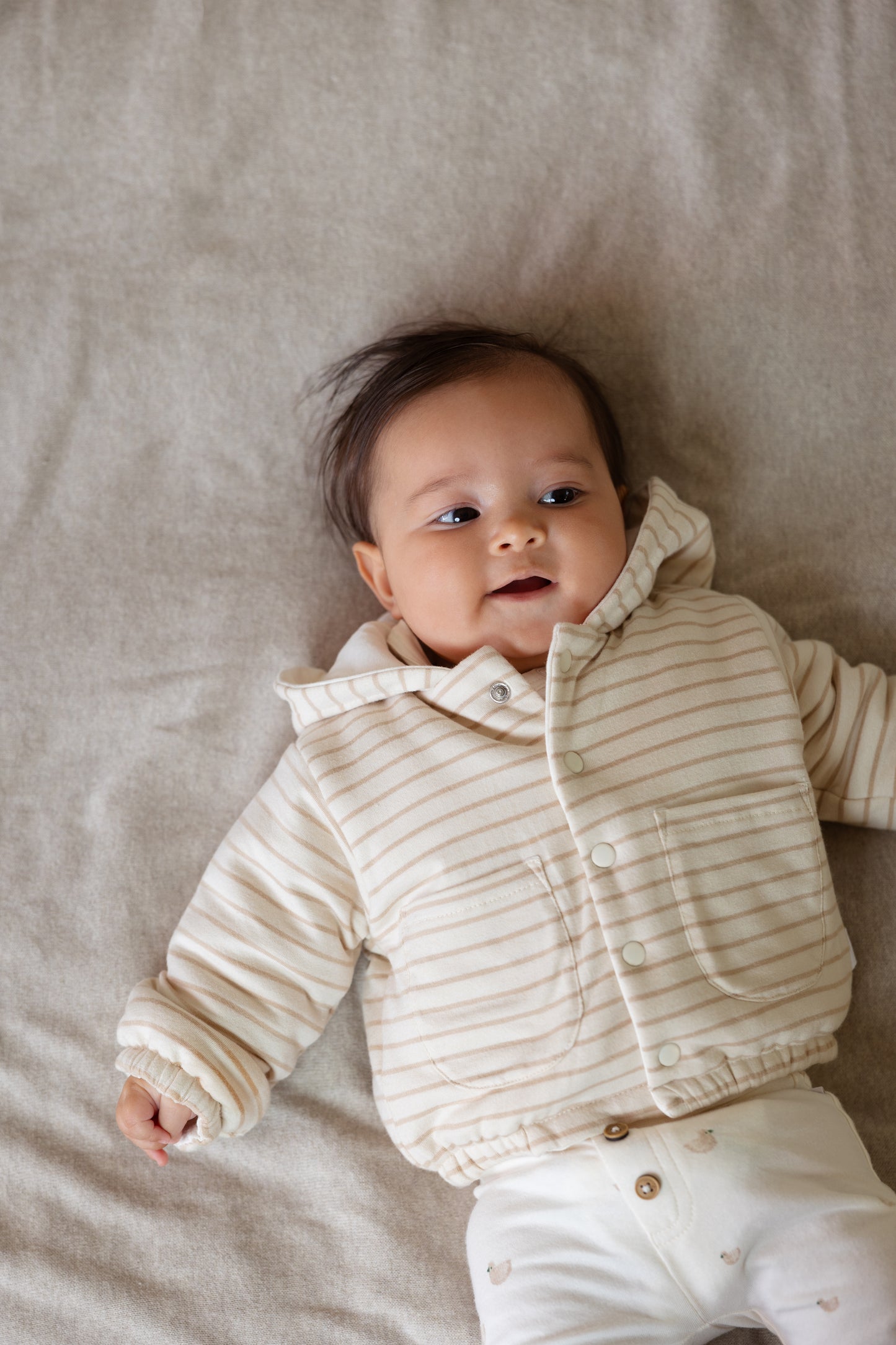 || Noppies || Reversible vest met streepjes